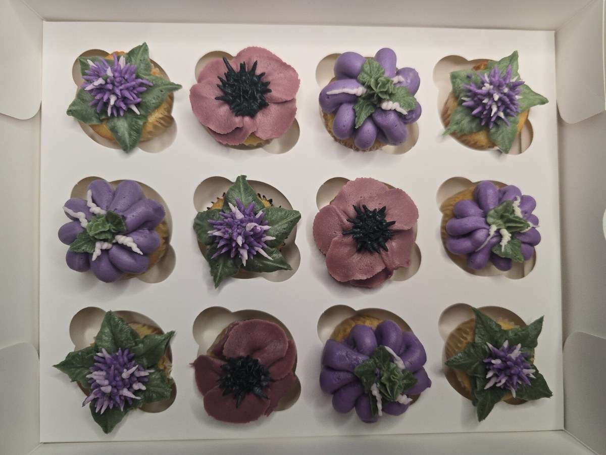 Box of twelve violet and mauve Mini Bloom cupcakes